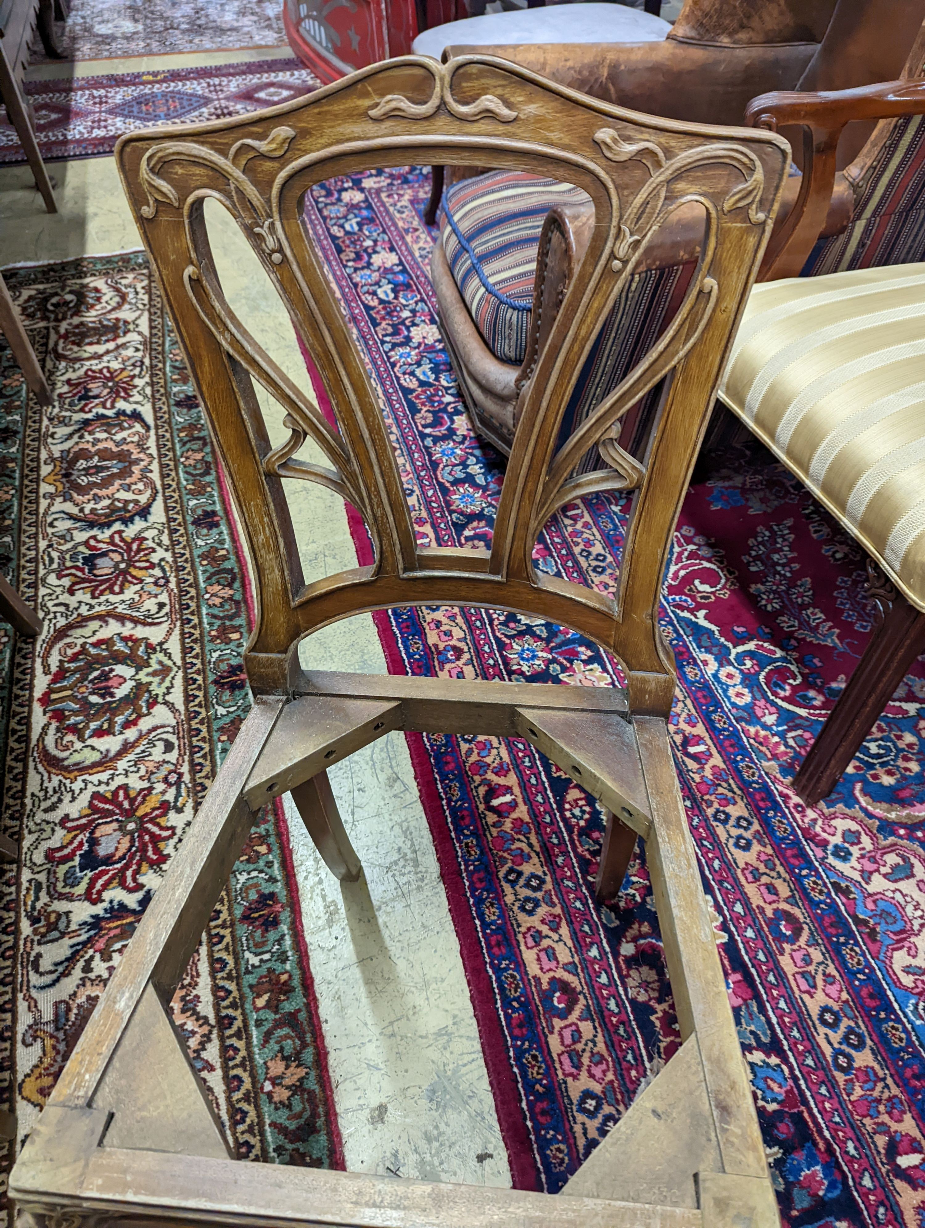 A set of six Majorelle style mahogany dining chairs (no seats). H-92cm.